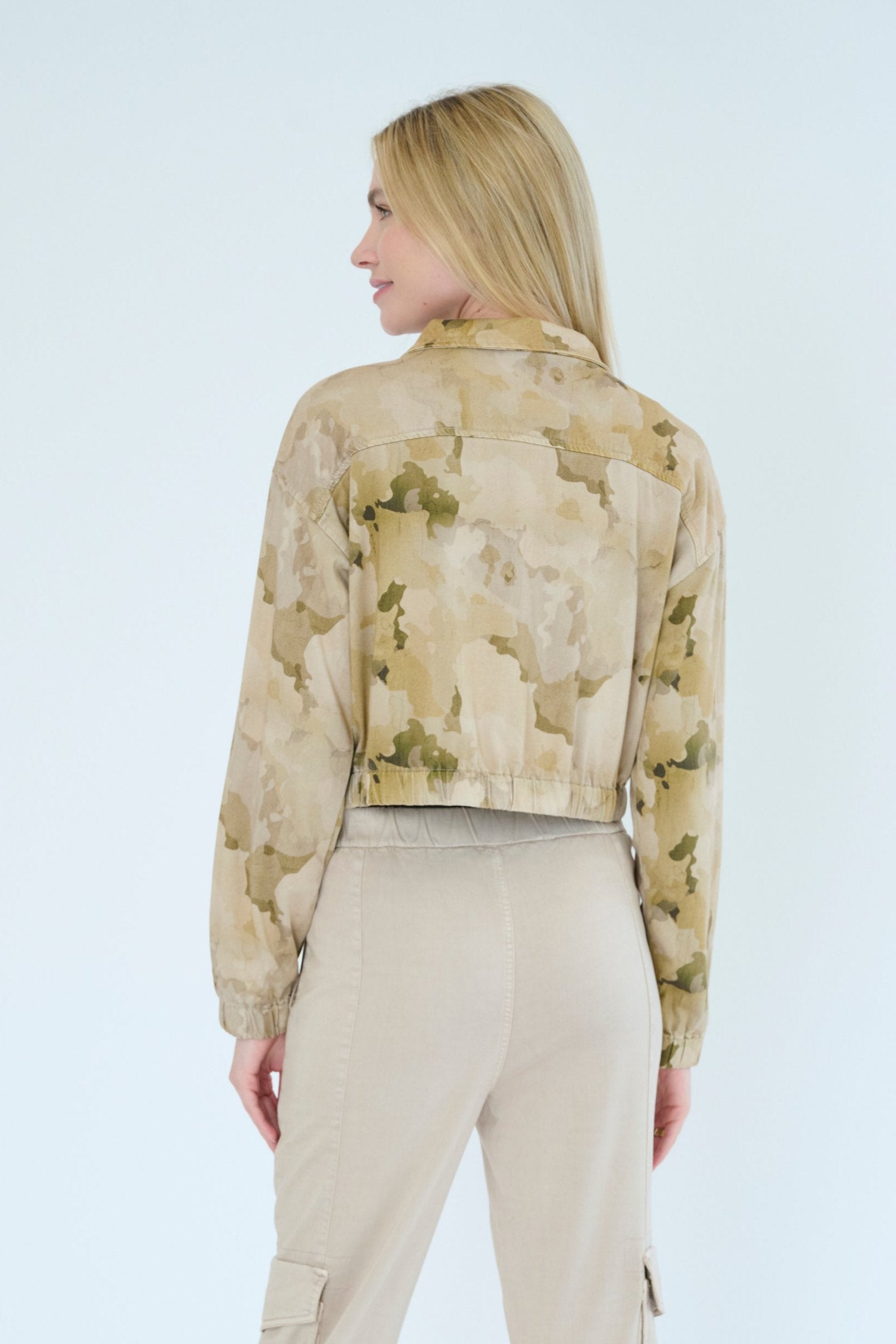 Back view of model wearing Marrakech Nelle Jacket in Oat Camo color. 