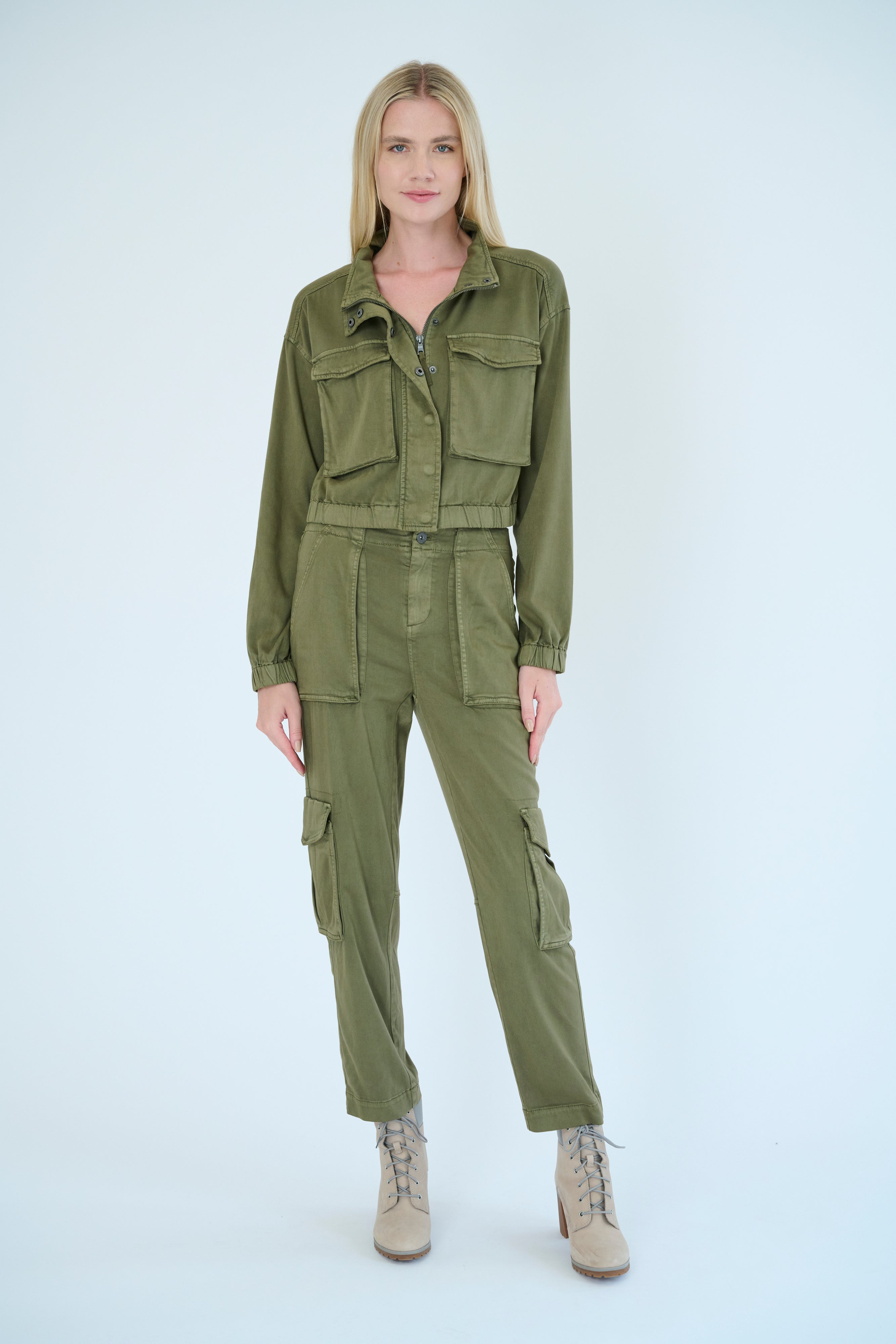 Front view of model wearing Nelle jacket and Raisa pant in Pine color