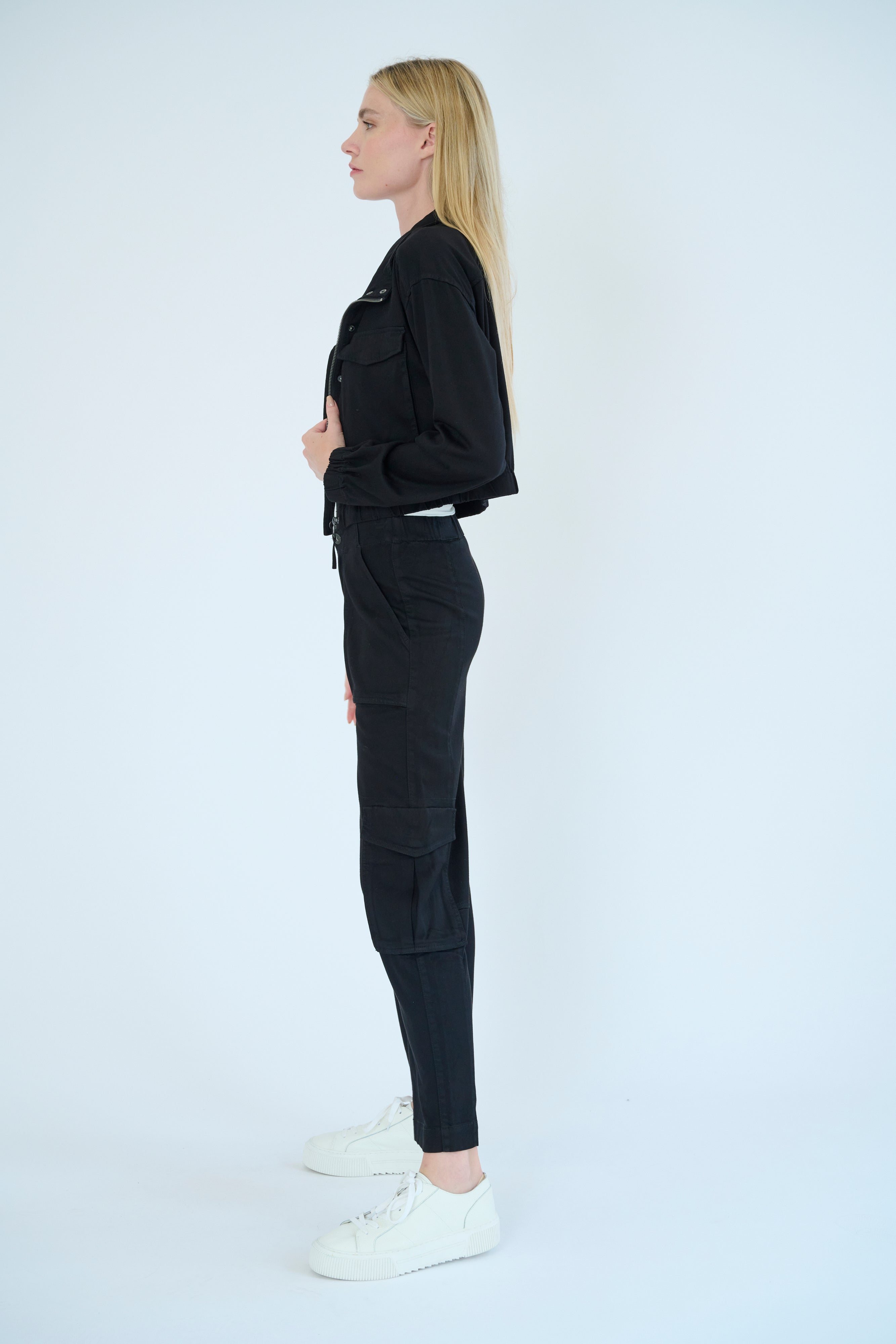 Side view of model wearing Raisa pant in Black color